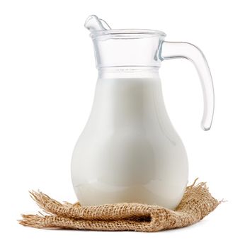 Glass milk jar isolated on white background close up