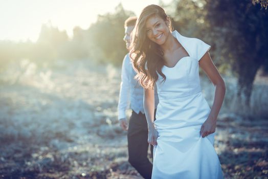 Just married couple together in nature background