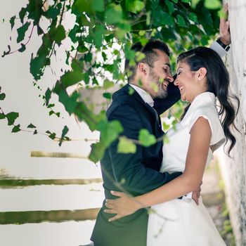 Just married couple together in urban background