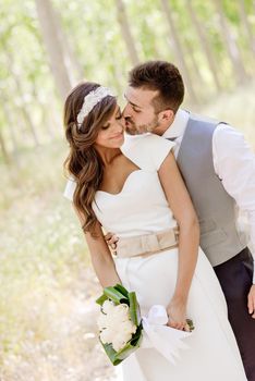 Just married couple together in nature background