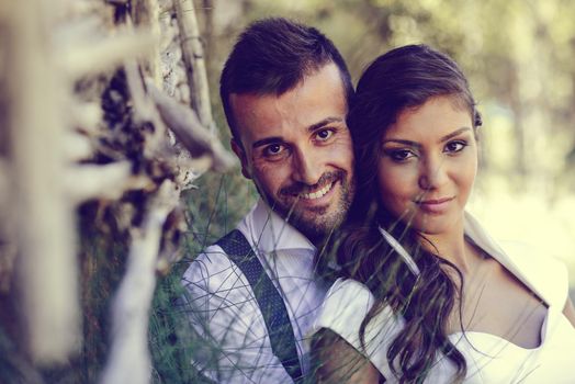 Just married couple together in nature background