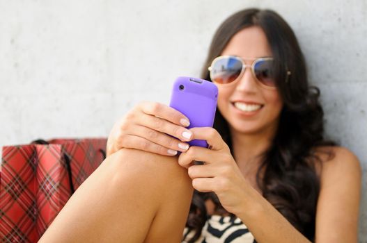 Young beautiful woman talking on phone