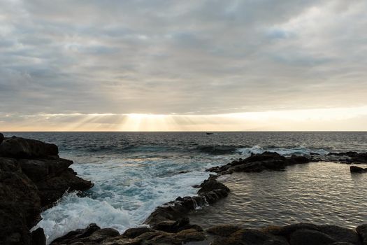 Old stone pier in sunset time at Tenerife, Canary Islands, Spain.