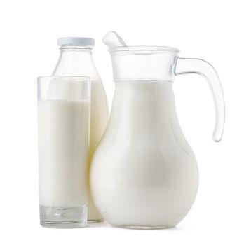 Glassware full of fresh milk isolated on white background