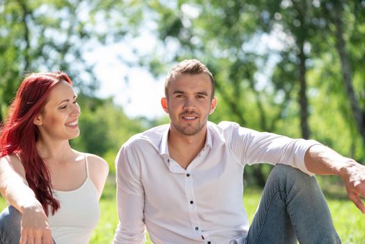 Young couple on a date in the park. Spending time with loved ones