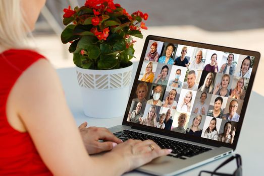 Virtual meeting online. Video conference by laptop. Online business meeting. On the laptop screen, people who gathered in a video conference to work on-line.