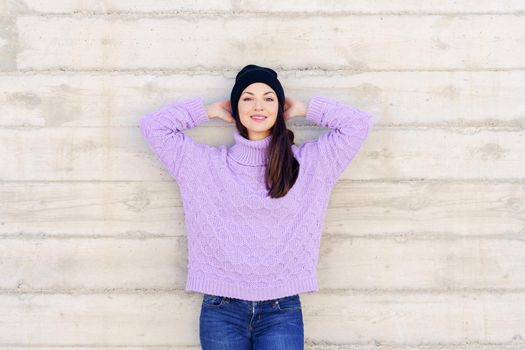 Happy young woman smiling outdoors. Lifestyle concept.
