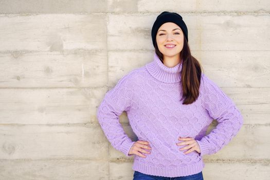 Happy young woman smiling outdoors. Lifestyle concept.