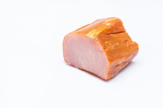 a piece of smoked pork - lisolated on white background - top view