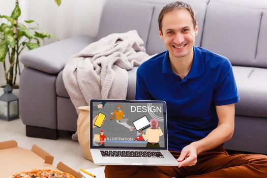 handsome hipster modern man designer working home using laptop at home