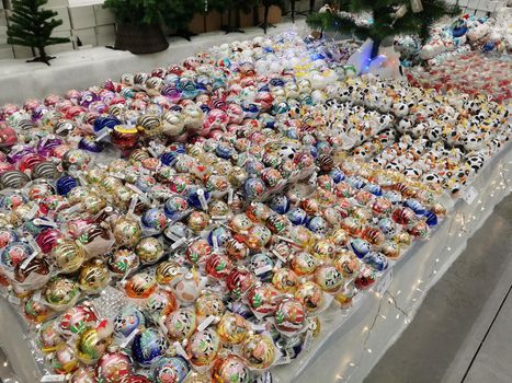 Christmas ornaments. Christmas market store - Christmas decorations in boxes.