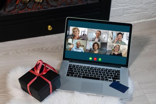 Virtual meeting online. Video conference by laptop. Online business meeting. On the laptop screen, people who gathered in a video conference to work on-line.