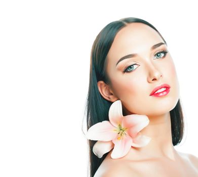 young attractive lady closeup with hands on face isolated flower lily brunette spa nude makeup, beauty concept