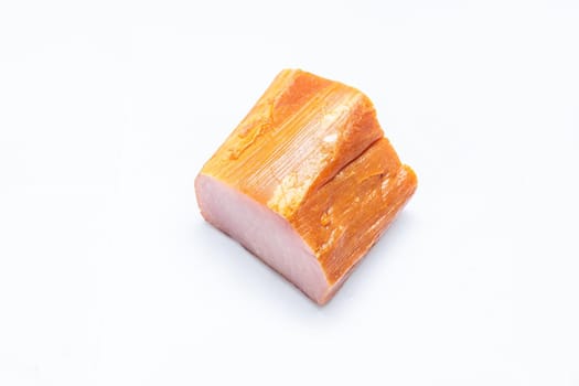 a piece of smoked pork - lisolated on white background - top view