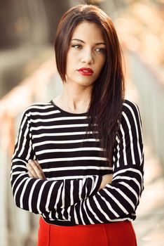Portrait of pretty girl with green eyes wearing young clothing