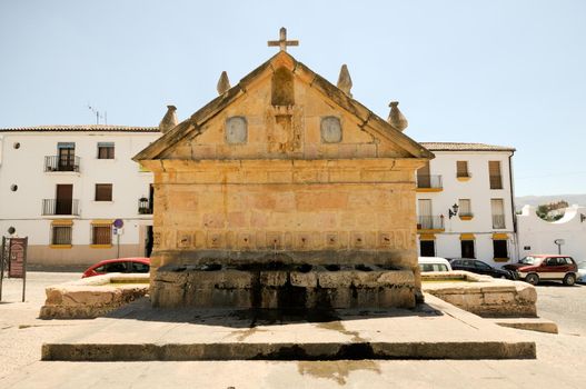 Ocho ca os fountain in Ronda, one of the famous white villages in M laga, Andalusia, Spain