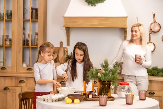 kids baking christmas cookies before the celebration of Christmas. Family