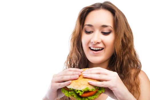 Happy Young Woman Eating big yummy Burger isolated on white background