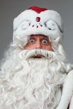 surprised father frost, picture isolated on light grey background