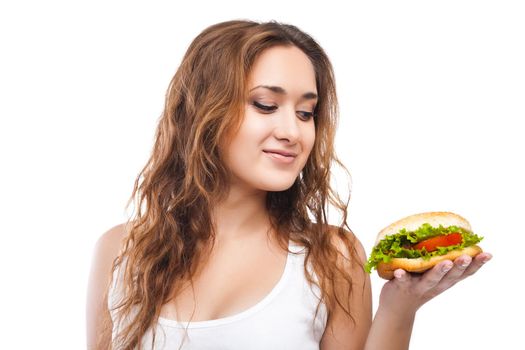 Happy Young Woman Eating big yummy Burger isolated on white background