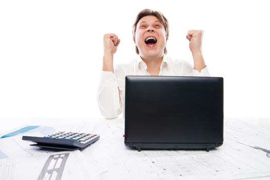 Happy young man in formal wear looking at laptop and gesturing