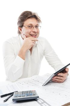 Businessman using tablet PC in office isolated over white. Draft on table