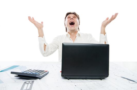 Happy young man in formal wear looking at laptop and gesturing