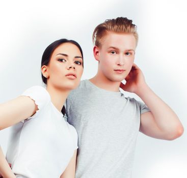 modern hipster guys together couple diverse nations, asian girl and caucasian blond boy isolated on white background, lifestyle people concept close up