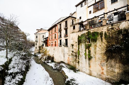 Snow storm in Darro river. Granada, Andalusia, Spain
