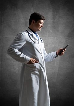 The doctor with the computer tablet. Digital technology in healthcare