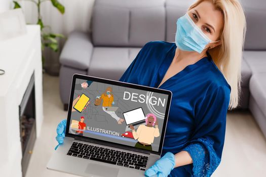 Freelance. A young woman is working at a computer in rubber gloves, and removing the medical mask from her face, looks up. Home decor. The concept of quarantine, self-isolation and remote work