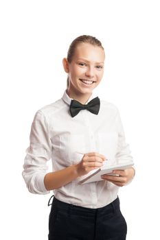Portrait of cheerful waitress in uniform taking order while looking at camera.Studio shot