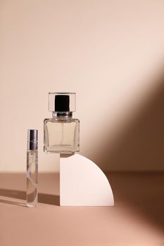 perfume bottle on the neutral modern background. perfect smell for him, man present