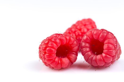 Fresh raspberry isolated on a white background