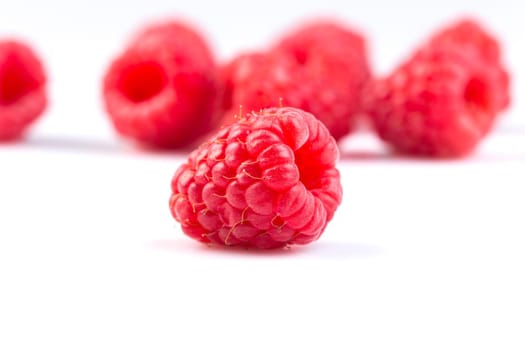 Fresh raspberry isolated on a white background