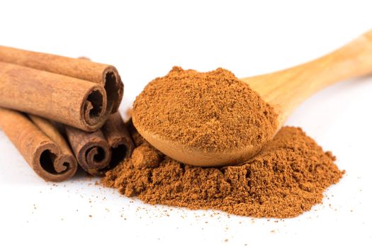 cinnamon ground and sticks isolated on a white background