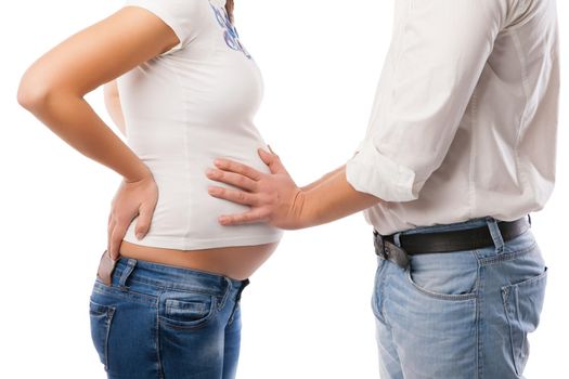 Young attractive couple pregnant mother and happy father