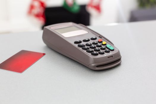 credit card terminal, credit card on table background