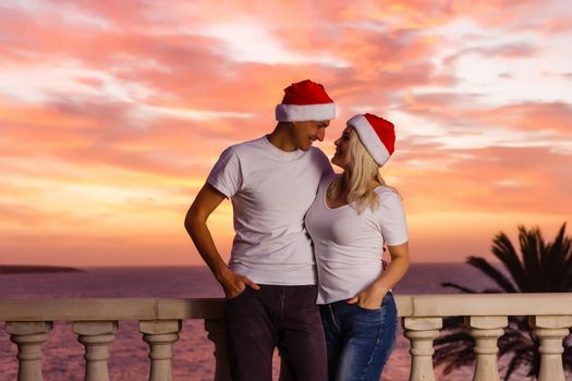 Woman admiring sunset from her balcony