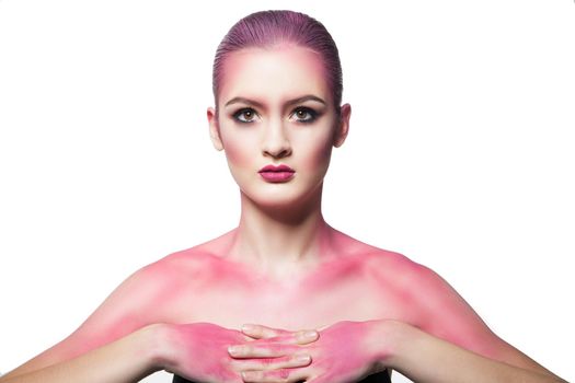 Topless model with bare shoulders covered with pink glitter.Isolated