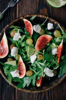 Delicious greek salad with the figs and goat cheese