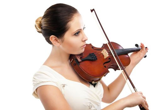 Beautiful young woman playing violin over white background