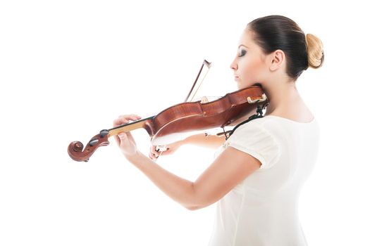 Beautiful young woman playing violin over white background