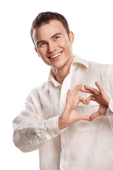 Portrait of happy man making heart from his hands on white background