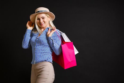 woman with shopping bags on black friday