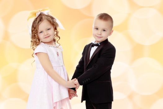 little cute boy and girl hugging playing on white background, happy family smiling