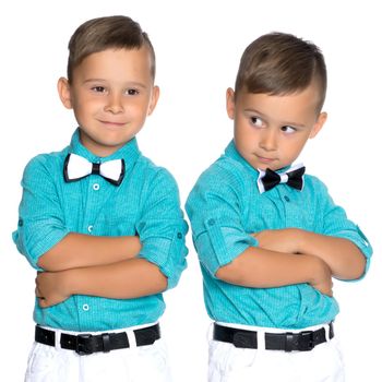 Two little brothers of Gemini together are sad. Isolated on white background