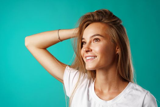 Portrait of a young beautiful happy caucasian woman smiling