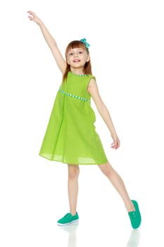 A little girl with long blond hair and a short bangs, in a short summer dress.The girl raised her hand up.