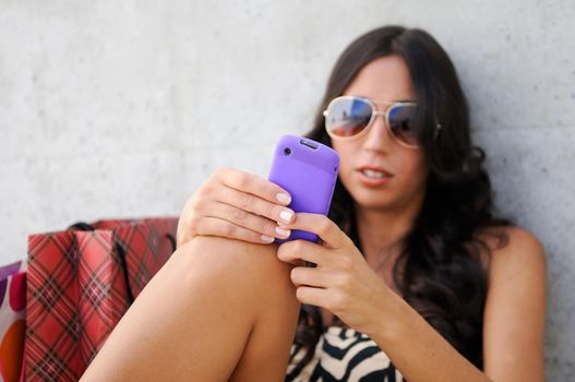 Young beautiful woman talking on phone